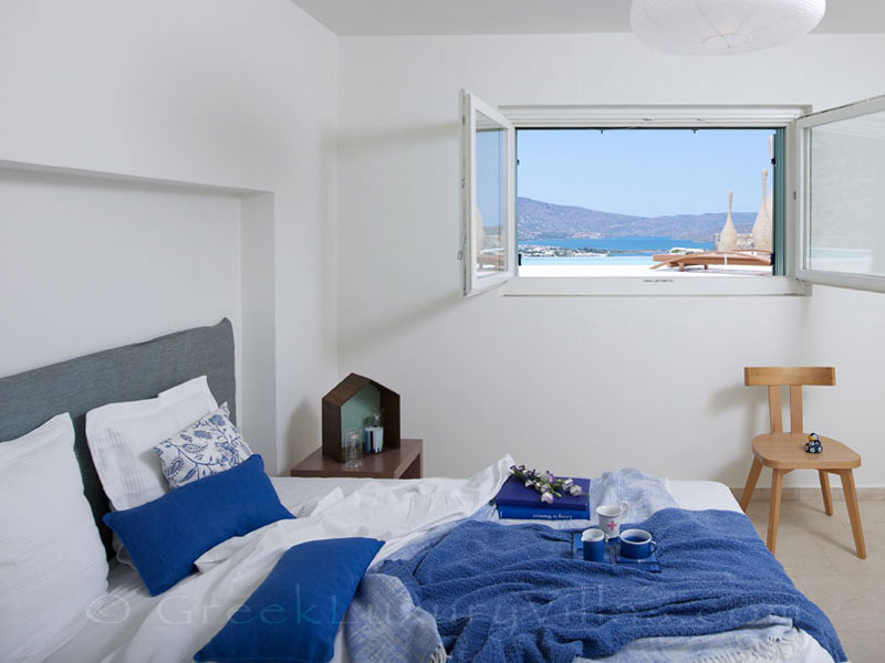 Sunny bedroom in a big luxury villa in Elounda, Crete