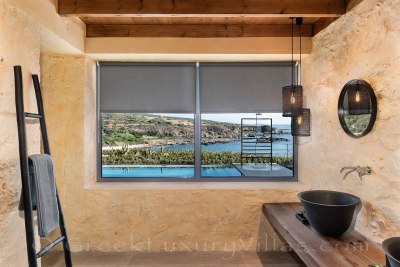 Bathroom sea view from seafront luxury villa with pool in Crete