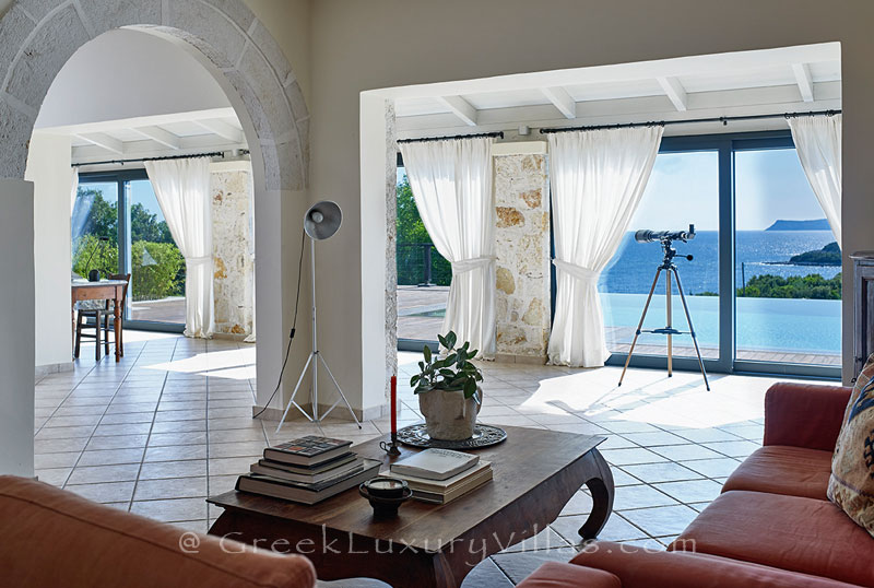 The seaview from the living-room of a luxury villa with a heated pool