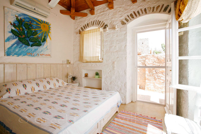 The bedroom in a romantic traditional house in Hydra