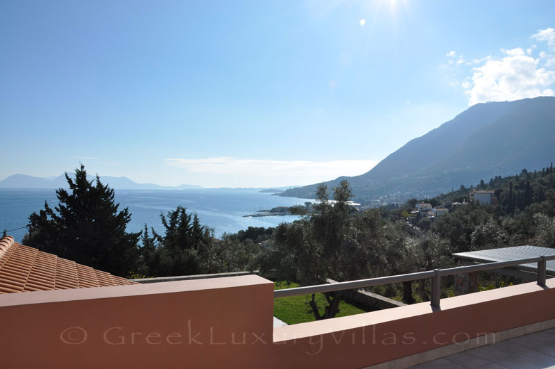 The seaview from the veranda of a modern luxury villa with a pool in Lefkas