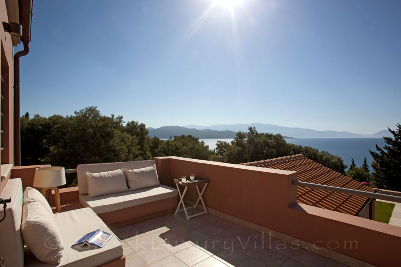 The seaview from a veranda of a modern luxury villa with a pool in Lefkas