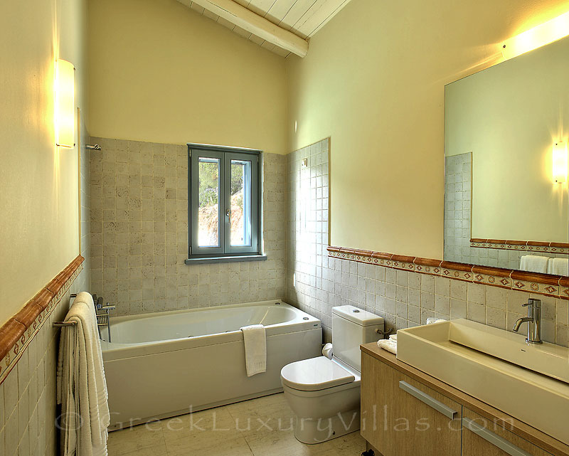 A bathroom in the villa with seaview and a pool in Lefkas