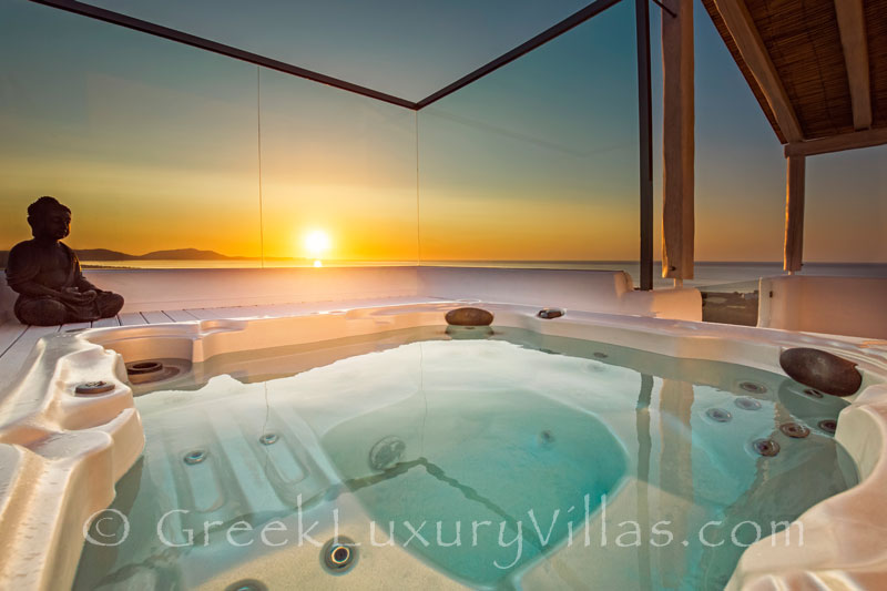 Sunset from the outdoor jacuzzi of a luxury villa in Rhodos