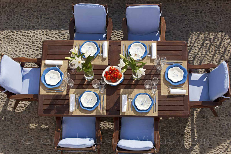 Outdoor dining area of a mansion luxury villa in Oia, Santorini