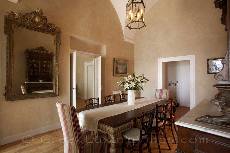The dining area of an elegant villa in Oia, Santorini