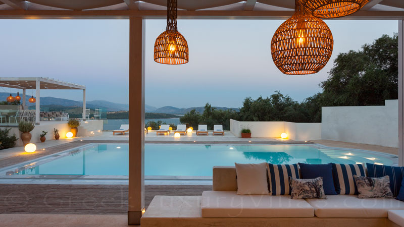 Outdoor lounge of a luxury villa with pool in Corfu