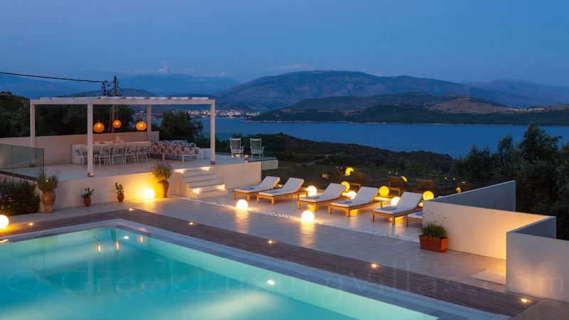 The outdoor lounge of the luxury villa with a pool in Corfu