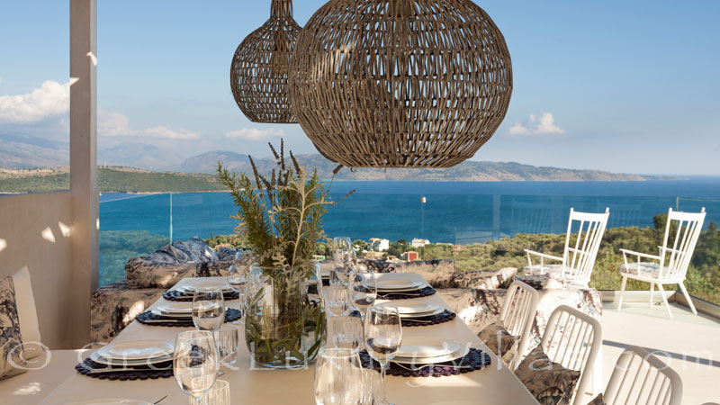 Outdoor dining with seaview at a luxury villa in Corfu