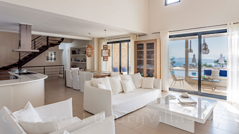 The sunlight in the open plan lounge of a luxury villa in Corfu
