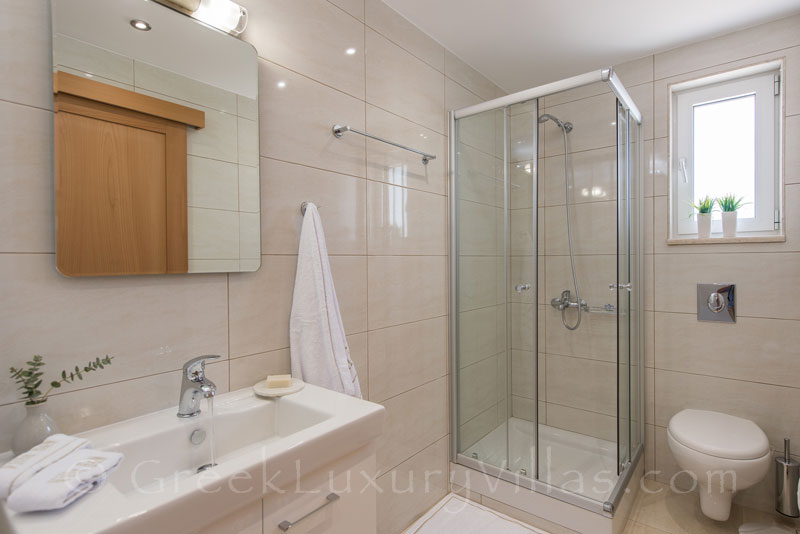 bathroom of modern villa with private tennis court and pool