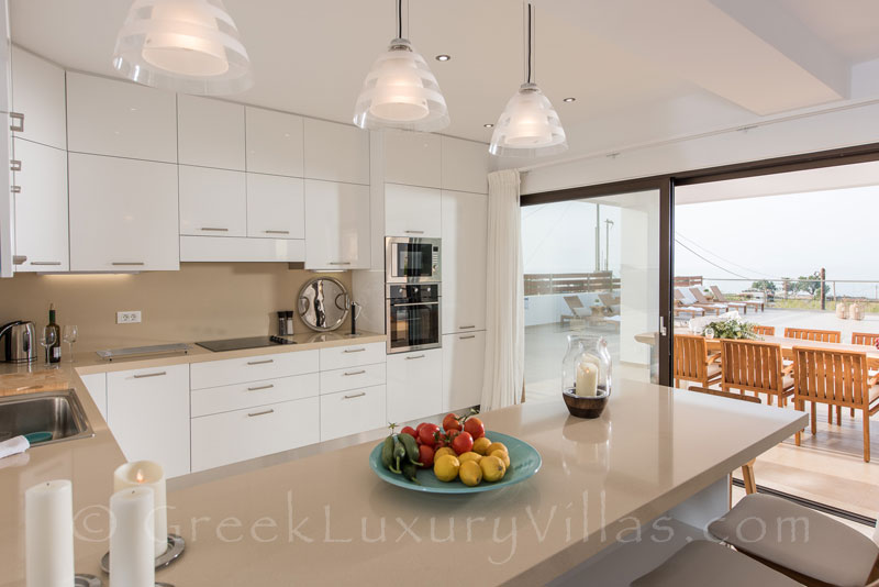 kitchen of modern villa with private tennis court and pool