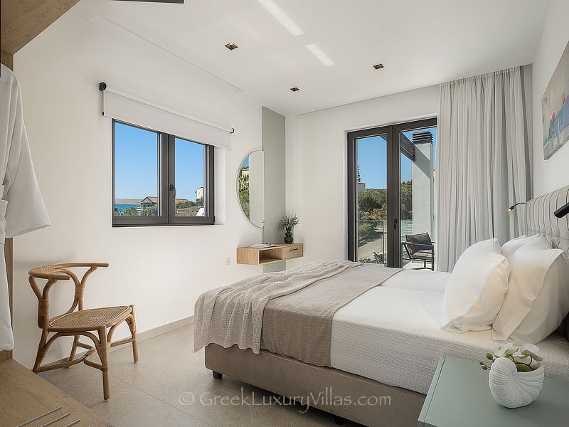 double bedroom of modern villa by the sea in Crete, Greece