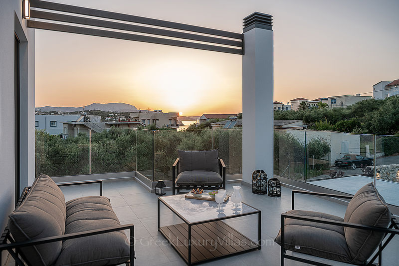 sunset vistas from bedroom balcony in Cretan luxury villa