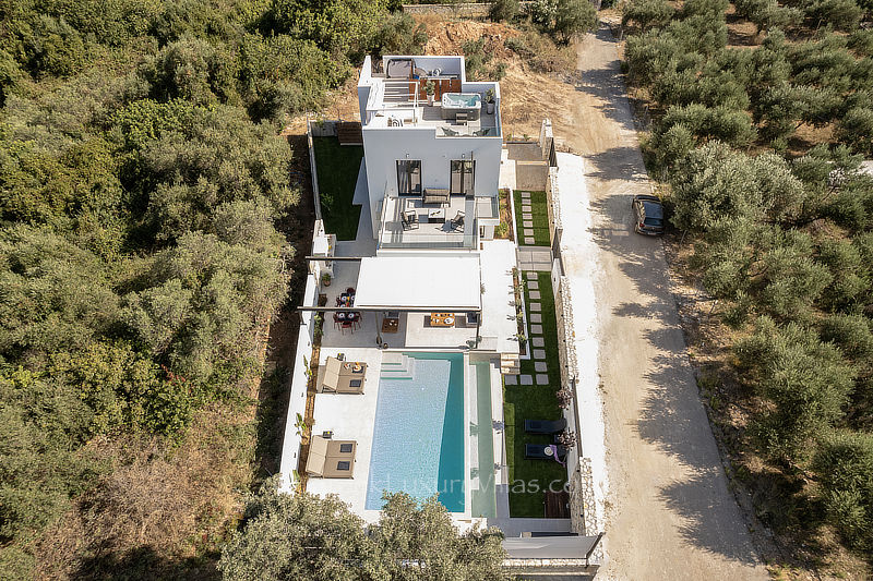 aerial view of villa with pool and garden in Crete