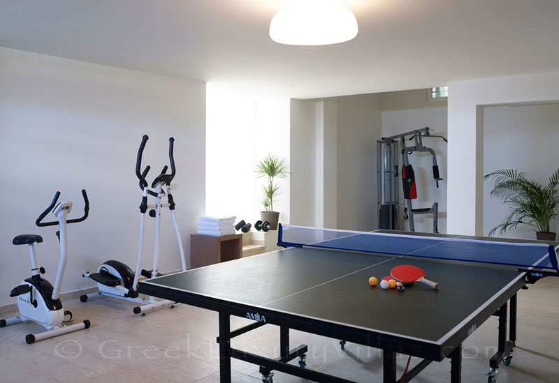 The playroom and the gym of a big luxury villa in Elounda, Crete