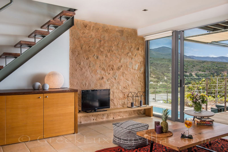 Living room of seafront villa with pool in Crete