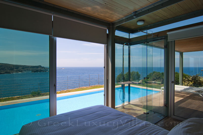 modern seafront villa with pool and amazing sea view from bed