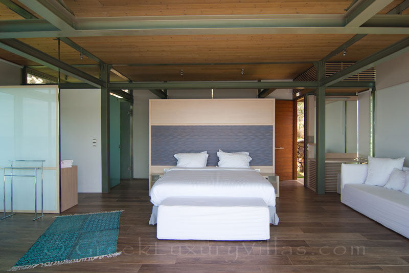 Crete modern seafront villa with pool guesthouse bedroom