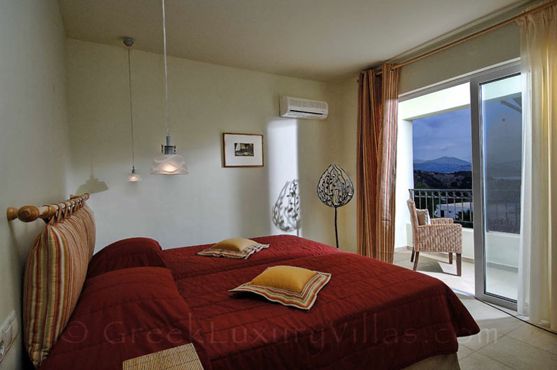 Bedroom of modern villa with beach access and pool in Crete