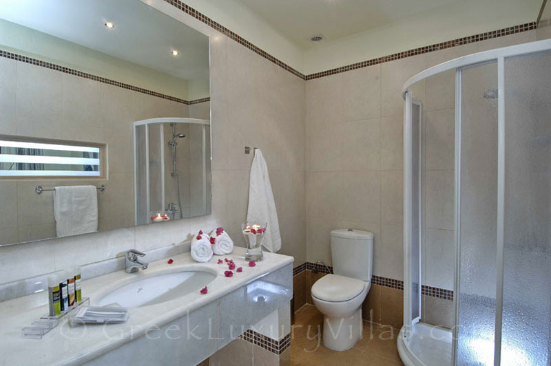 Bathroom of modern villa with sea access and pool in Crete