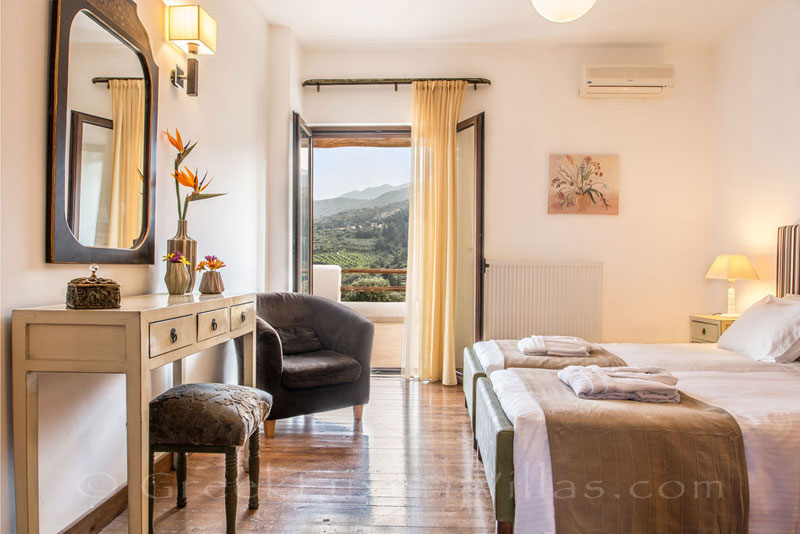 Bedroom of family villa with pool in Crete