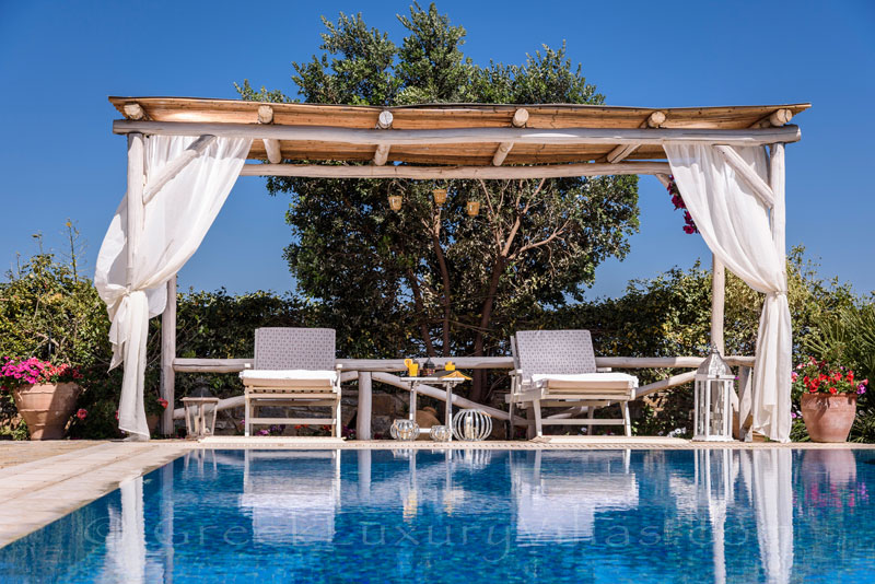 Pergola by the pool of luxury villa in Crete
