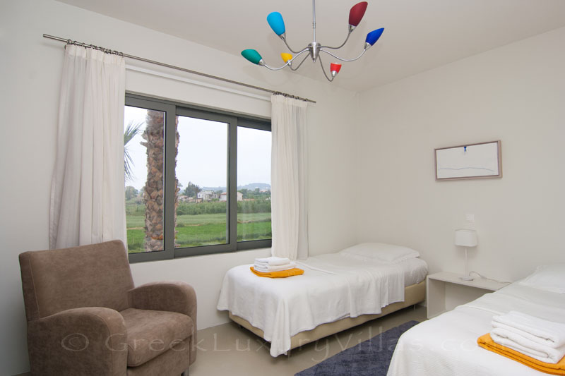Single beds of a beachfront villa in Maleme, Crete