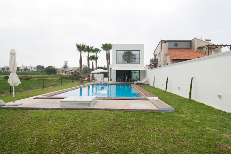 A beachfront villa with a pool in Maleme, Crete