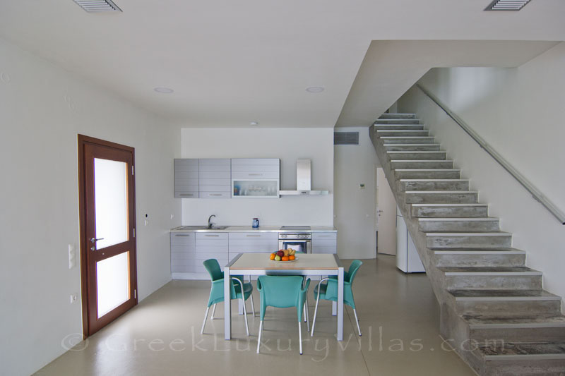 Open plan kitchen of a contemporary beachfront villa in Crete