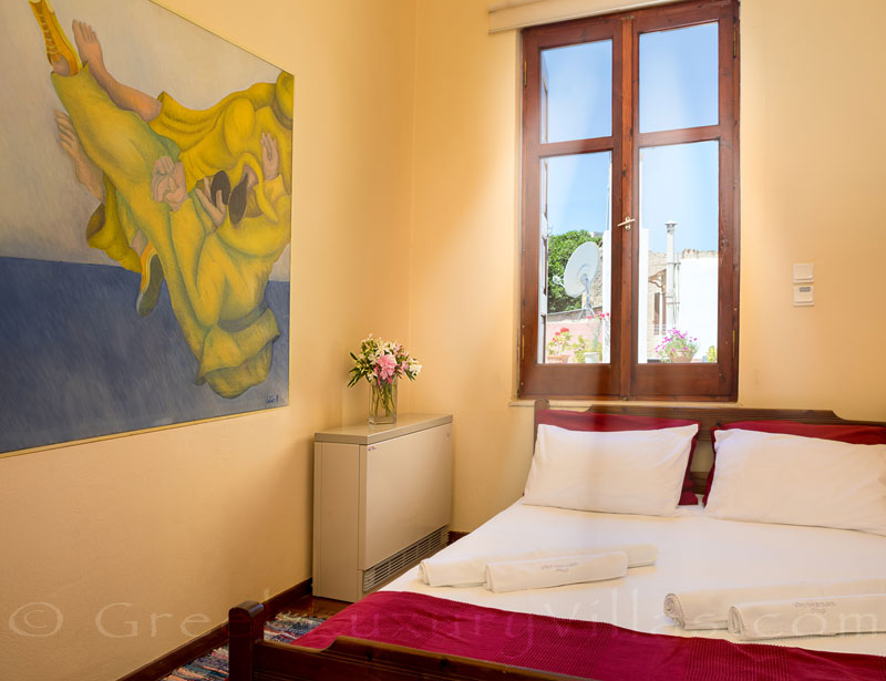 The guest room of an exclusive historic villa in a traditional village of Crete