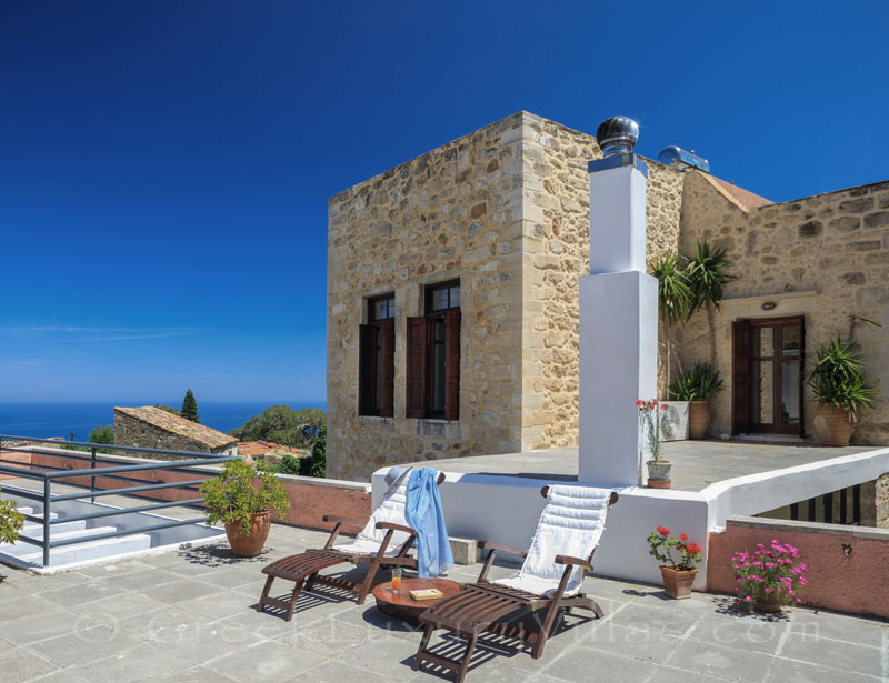 The roof terrace of an exclusive historic villa in a traditional village of Crete