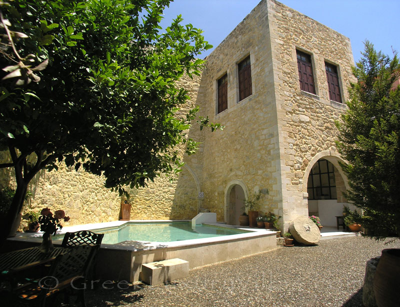 The yard of an exclusive historic villa in a traditional village of Crete