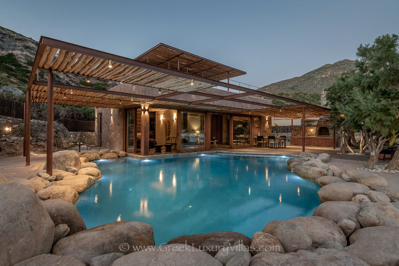 Natural stone pool at the beach house in Crete Greece