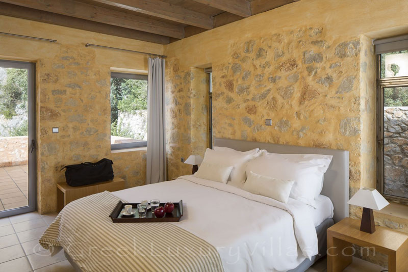 Bedroom of seafront villa with pool in Crete