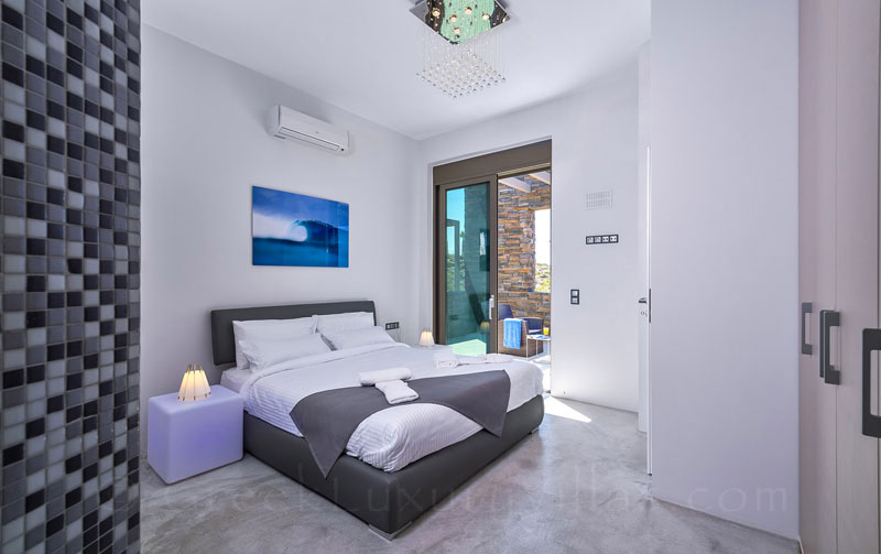 A bedroom of the modern luxury villa