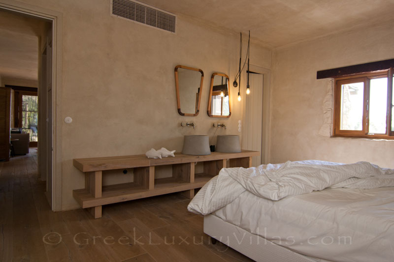 The bedroom of a beach house in Crete