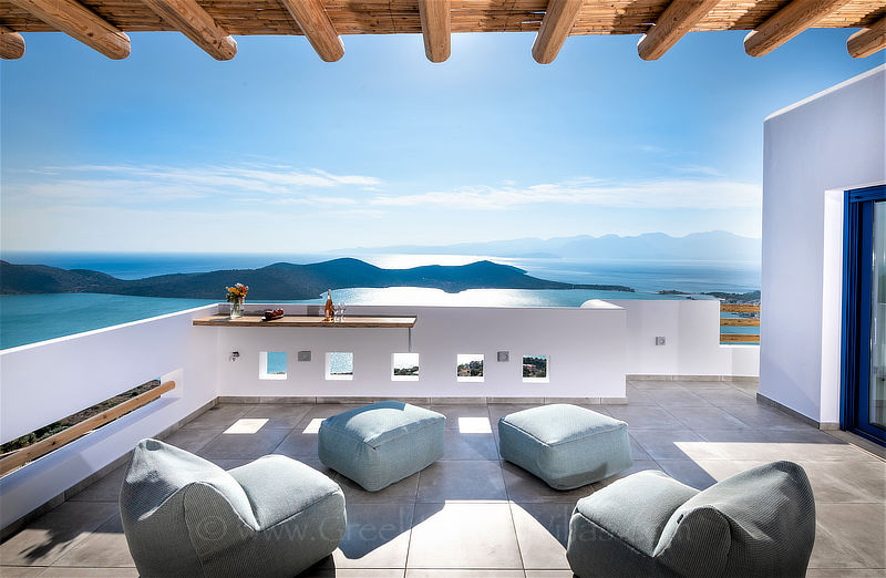 Shaded verandah with stunning sea view overlooking Elounda