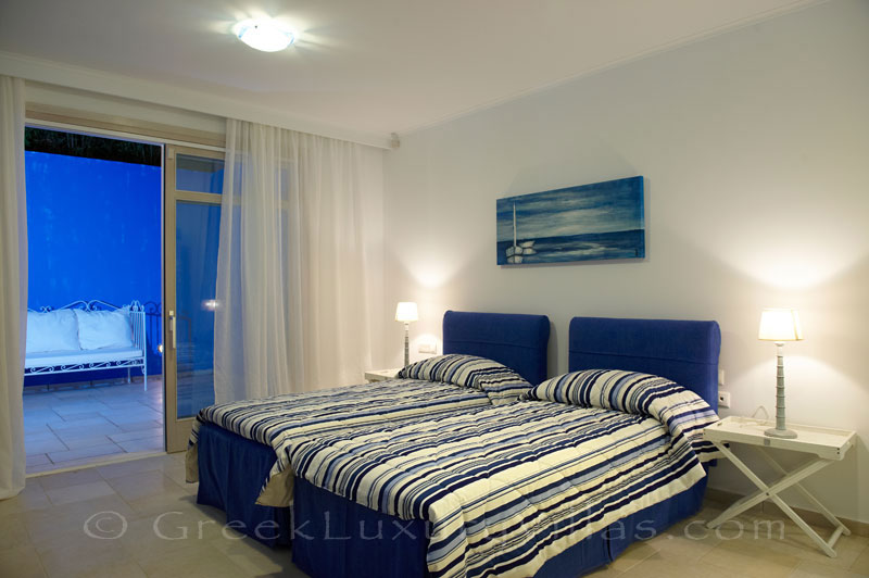 Bedroom of island style seafront villa in Almyrida Crete