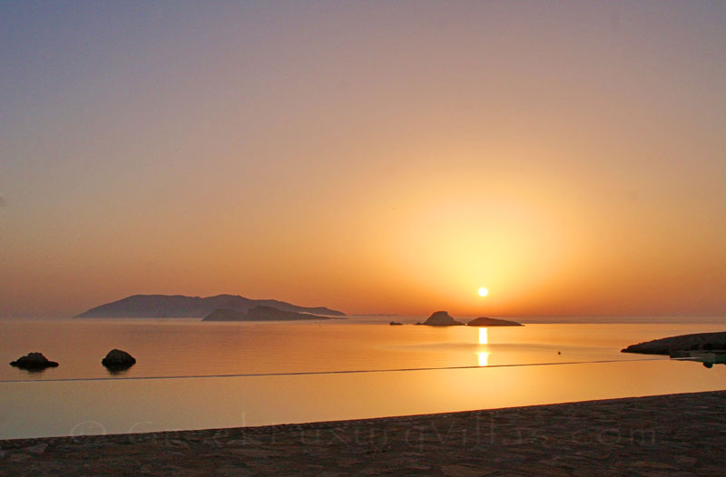 Sunrise at seafront villas with pool in Folegandros