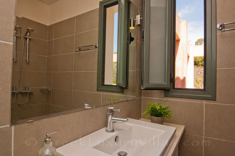 A bathroom in the modern, three bedroom villa near the beach in Kefalonia