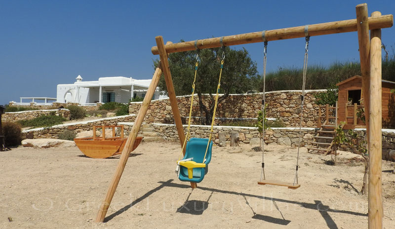 Private playground of luxury villa with pool in Koufonisi