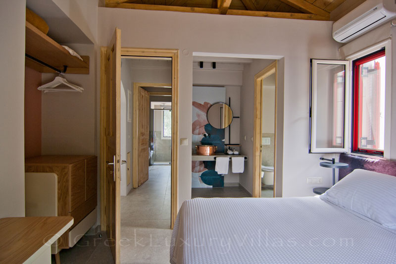 Modern bedrooms of the luxurious villa in Lefkas