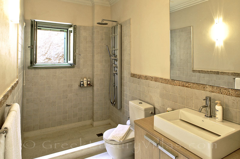 A bathroom in the luxury villa with a pool in Lefkas
