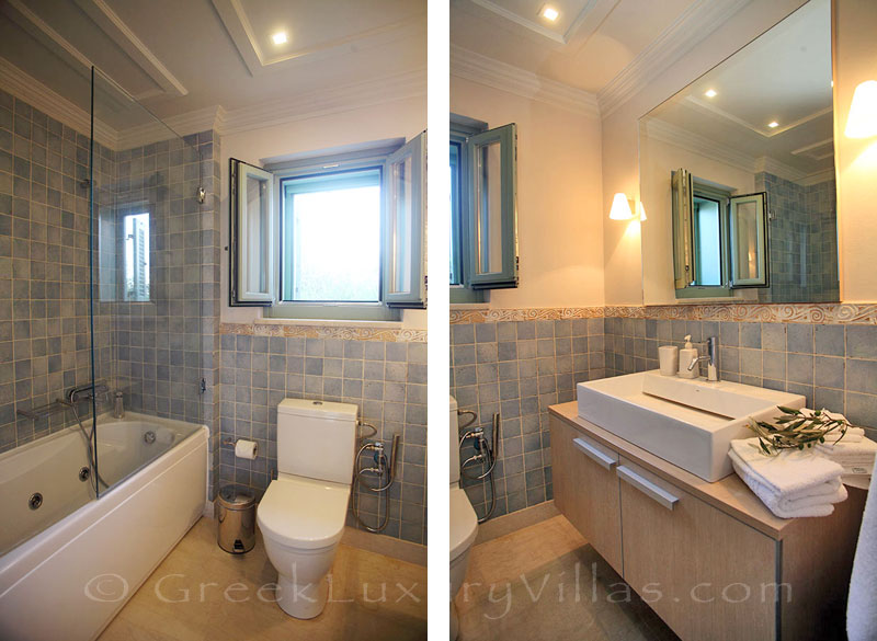 A luxurious bathroom in a villa with a pool in Lefkada