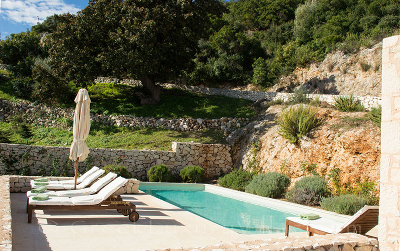 A luxury villa with a pool in Lefkada surrounded by nature