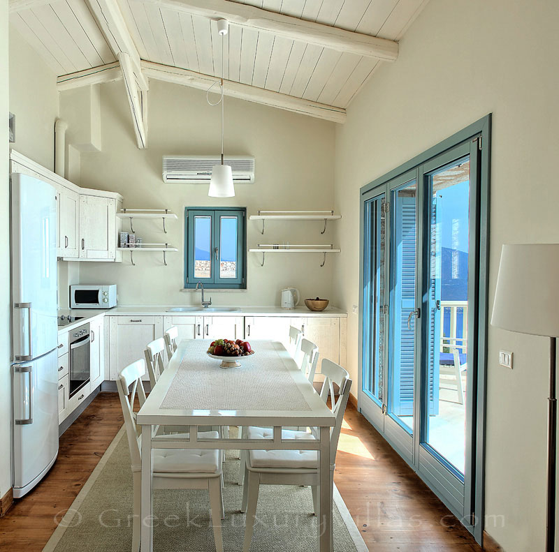 The kitchen of a villa with seaview and a pool in Lefkas