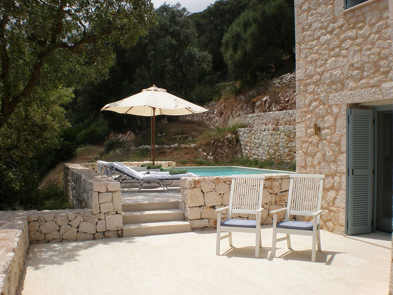 A terrace of a villa with seaview and a pool in Lefkada
