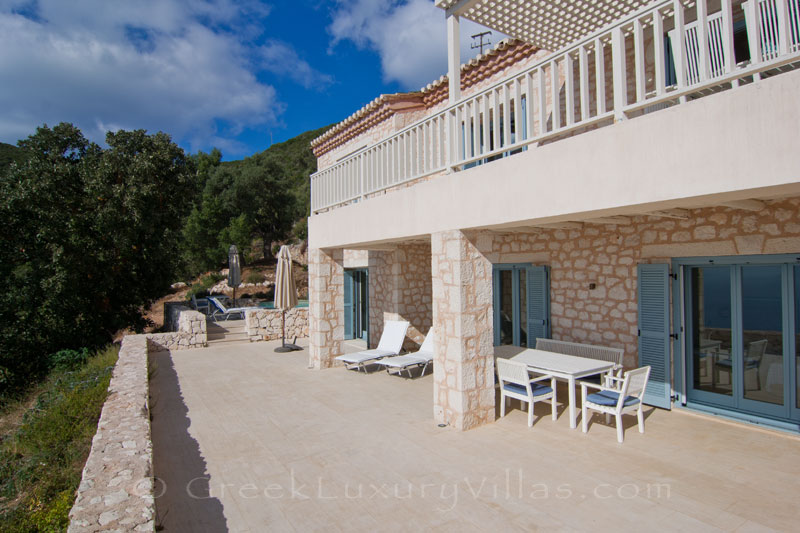 The terrace of a bedroom of a villa with sea view and a pool in Lefkada