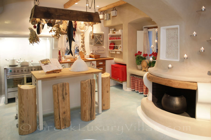 Open paln kitchen in a luxury villa with a pool in Naxos